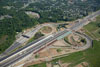 6/8/12: Aerial progress photo of Interchange 7. The contractor has begun to place the decking (green) onto the northbound outer roadway.
